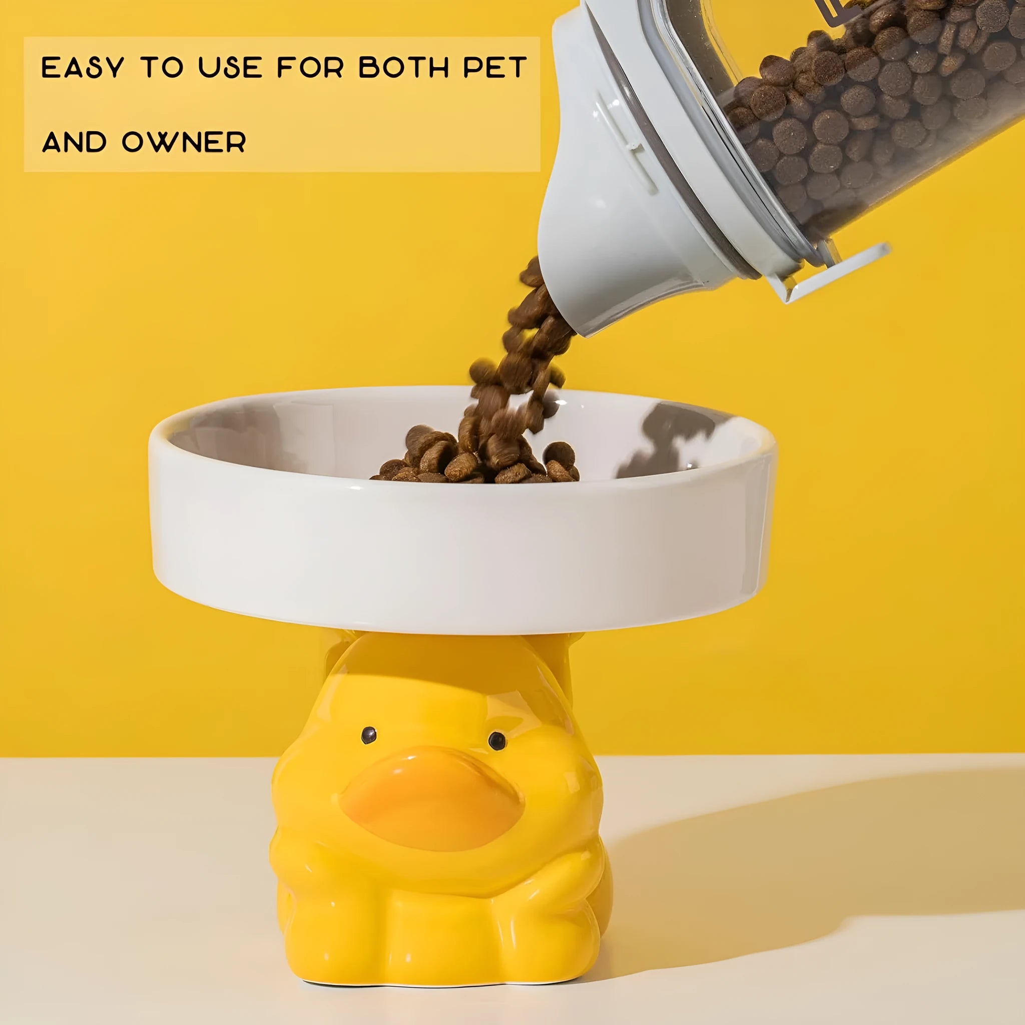 Ceramic raised cat bowl in animal theme design on white background