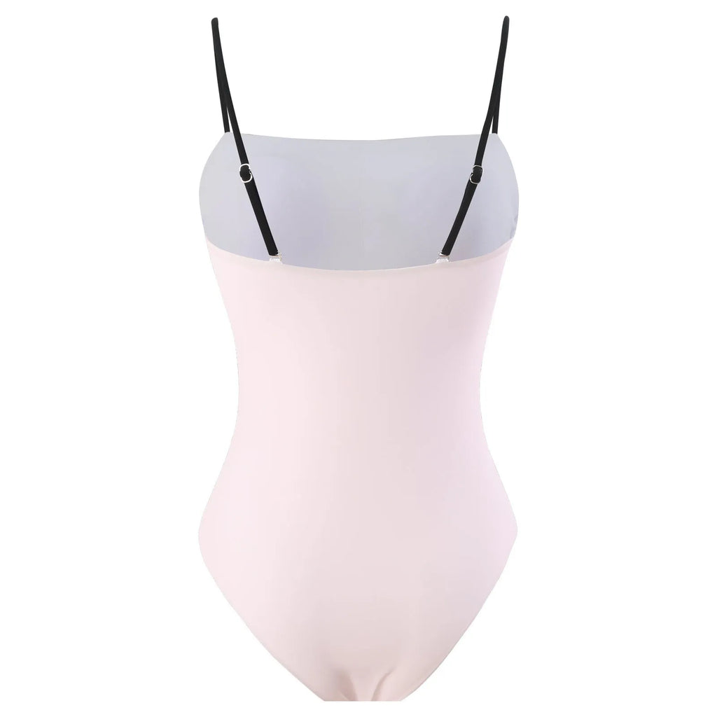 Women's patterned polyester bikini with attached sheer tulle skirt cover-up.