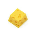 Yellow resin cheese wedge artisan keycap for mechanical keyboards with Cherry MX stem