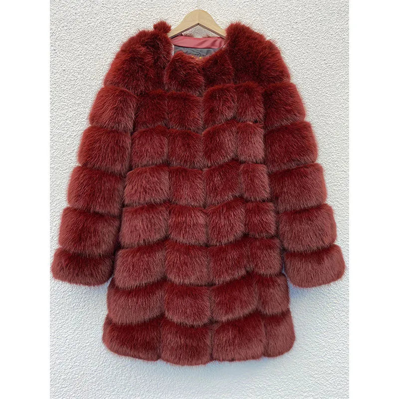 Women's long black artificial fur winter coat with regular sleeves on a hanger.
