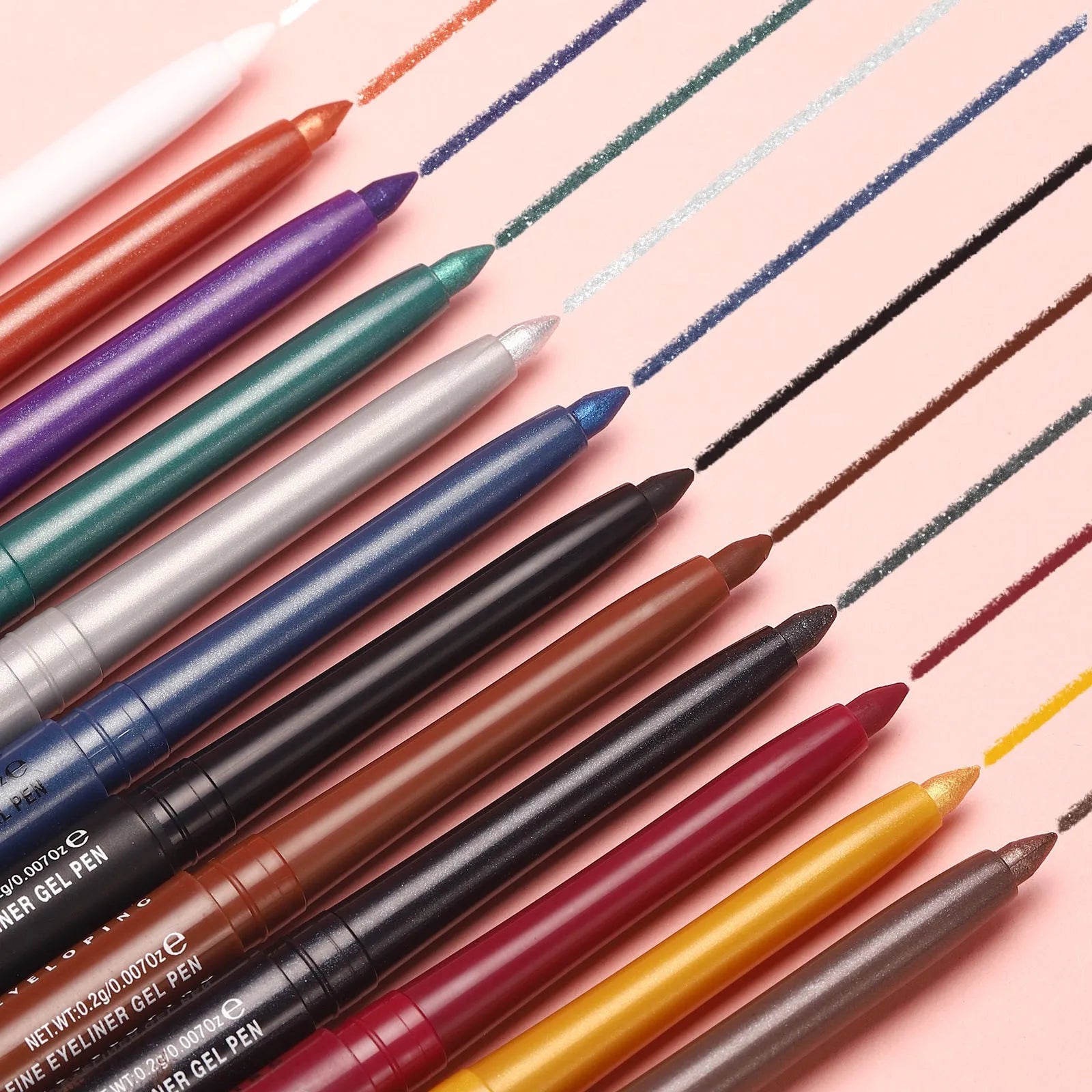 12 colourful gel glitter eyeliner pencils in vibrant shades arranged in a set