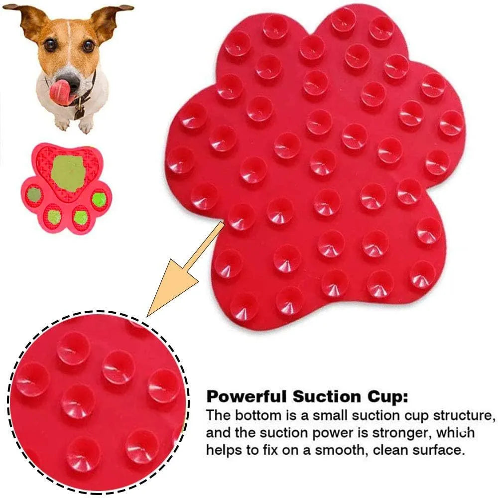 Blue bone-textured silicone dog licking mat with suction cups on a white tile wall