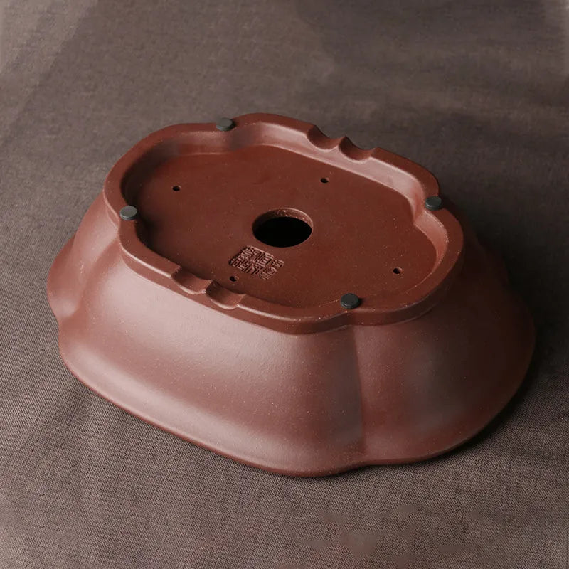 Handmade purple clay bonsai basin with traditional Chinese plain design measuring 25x20x7cm