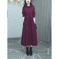 Purplish red plus size women's dress with extra long sleeves and long skirt length