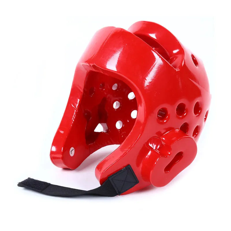 Red and blue martial arts protective gear set showing leg guards, helmet and boxing gloves for karate taekwondo training