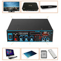 Black dual-purpose Bluetooth power amplifier with remote control on a table