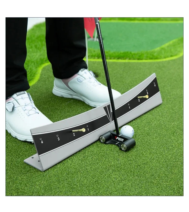 Golf putter trajectory balance simulator with adjustable push rod on a practice green.