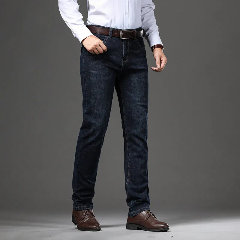 Woman wearing loose fit high elasticity straight-leg jeans in K276 blue.