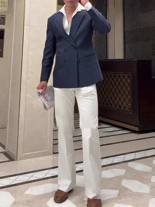 Men's classic striped double breasted blazer in regular fit on a hanger.
