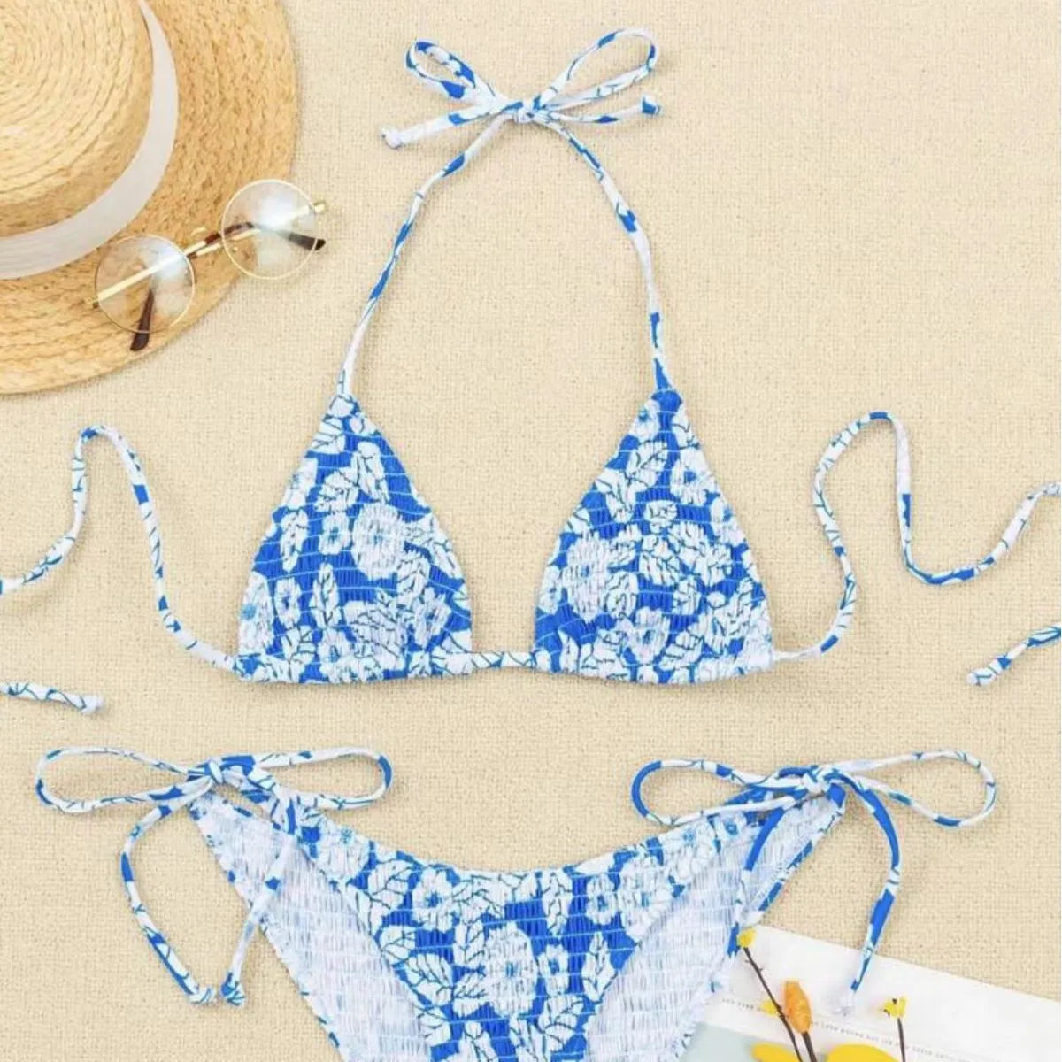 Women's floral pattern halter swimsuit briefs in polyester fabric showing colour options
