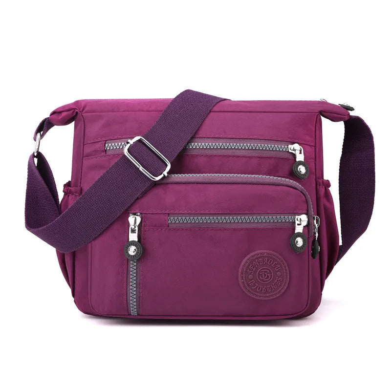 Gray nylon shoulder messenger bag with square vertical design and single strap