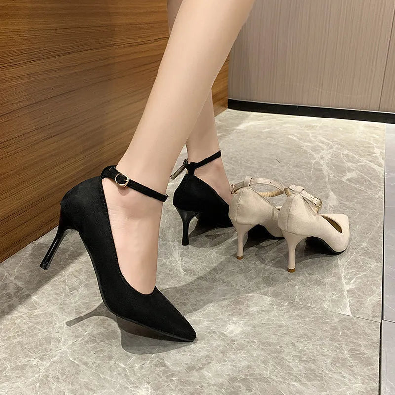 Women's black stiletto heels with skull pattern and buckle detail, 8cm heel height, rubber sole.