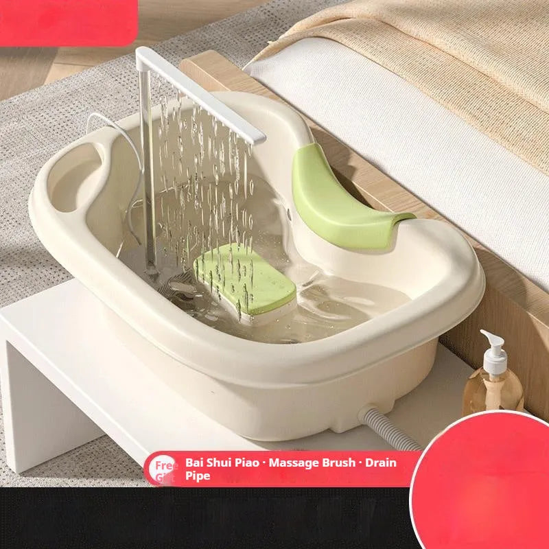 Portable shampoo basin with head pillow, water pump, and drainage pipe for bed hair washing