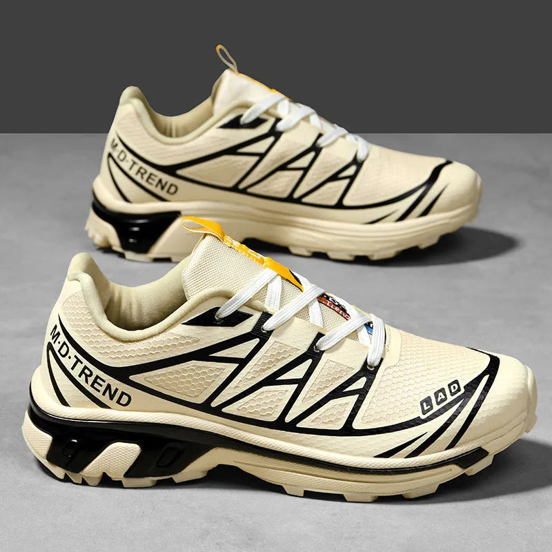 Men's and women's low-top artificial leather hiking shoes in multiple colours with flat rubber sole and lace-up front.
