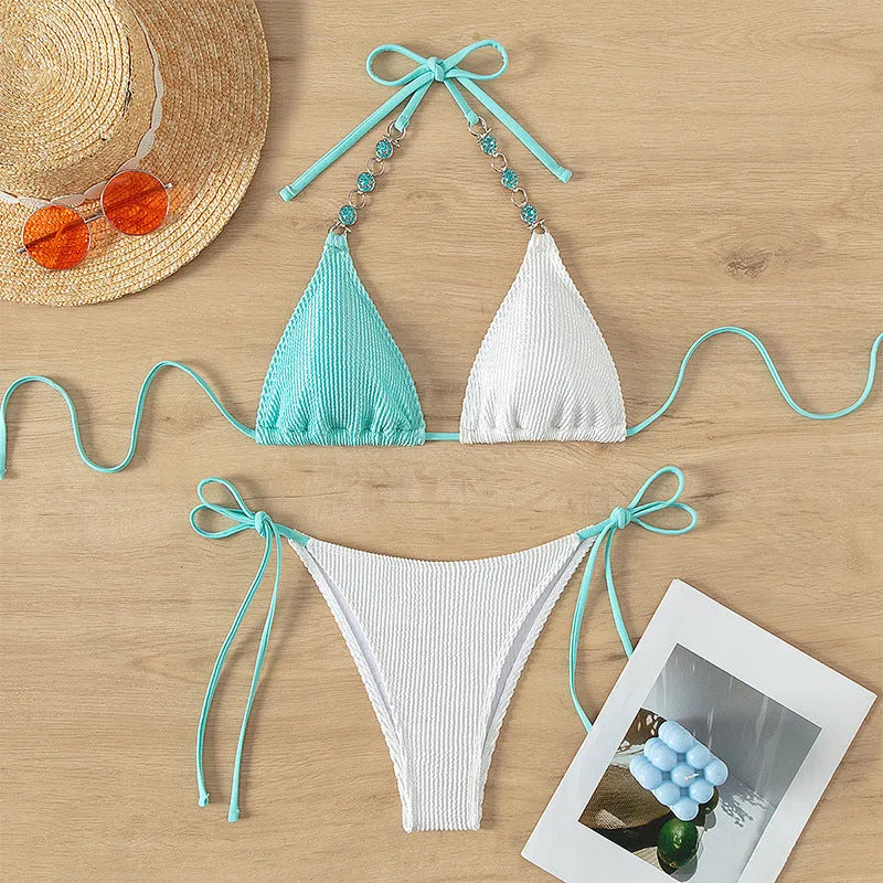 Women's colour matching swimsuit set with lace-up pearl chain, sleeveless top and shorts.