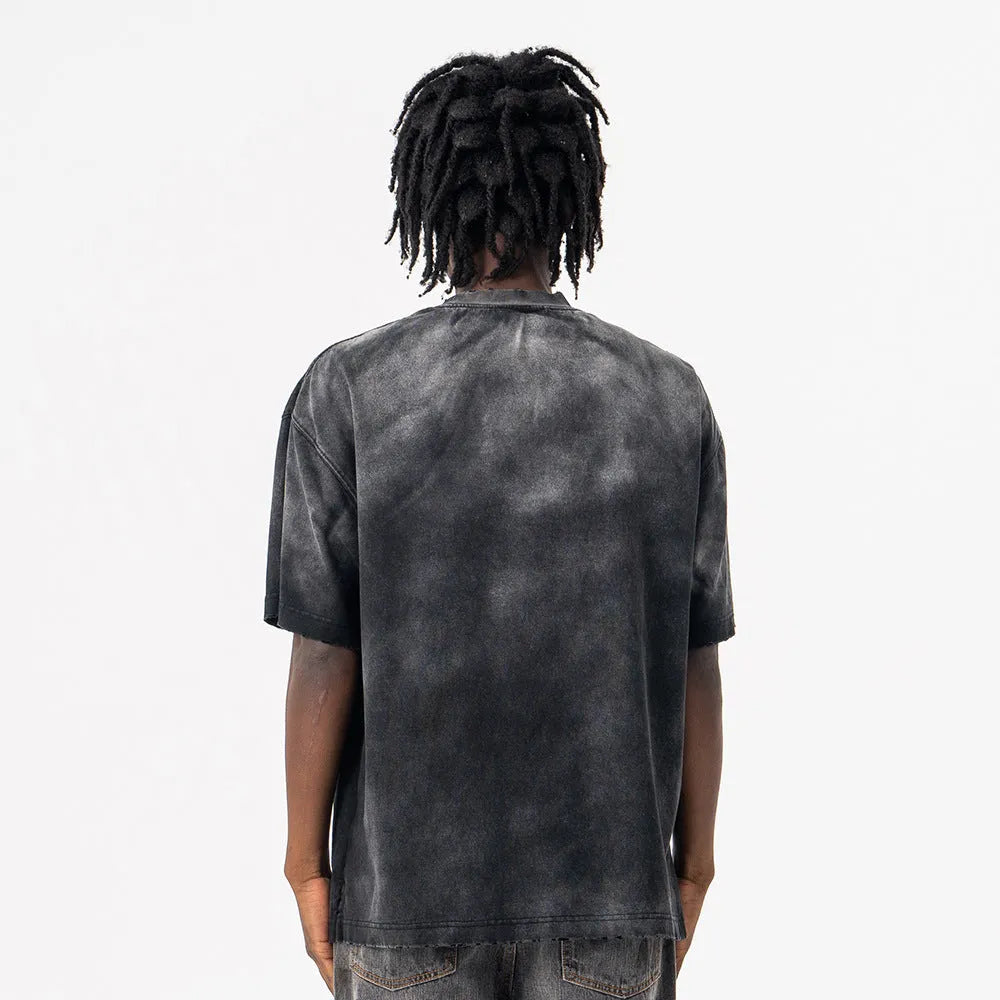 Black men's loose fit cotton T-shirt with drop-shoulder sleeves and a printed design.