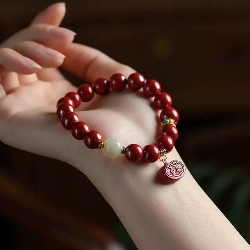 Natural cinnabar emperor sandstone bracelet with adjustable closure in 8mm or 10mm sizes