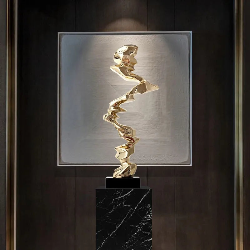 Minimalist abstract still life ornament made from natural resin in a choice of gold, silver, or blue finish.