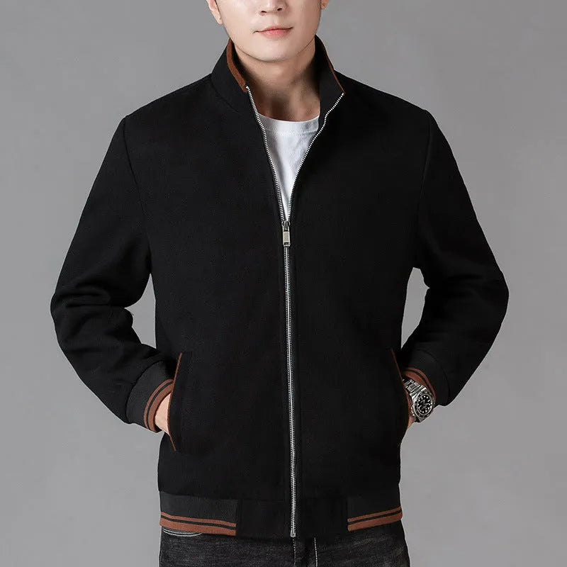 Men's grey polyester fleece sports jacket with long sleeves and a stash pocket on the chest.