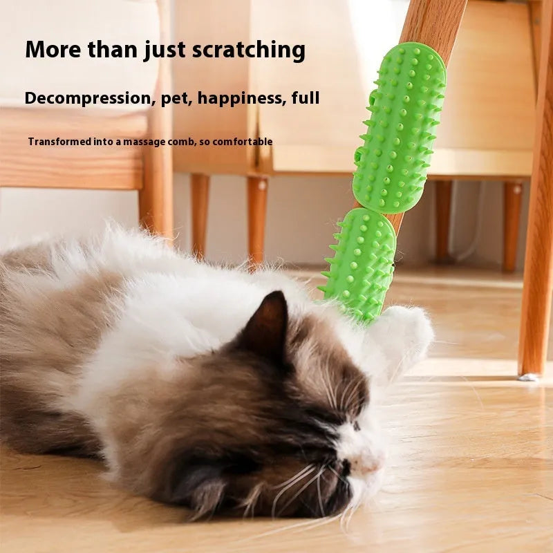 Silicone cat grooming comb with adjustable strap mounted on table leg, showing rounded teeth for pet hair removal