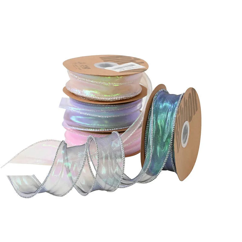 Colourful 4cm fishtail yarn craft ribbon on roll showing textured mesh construction