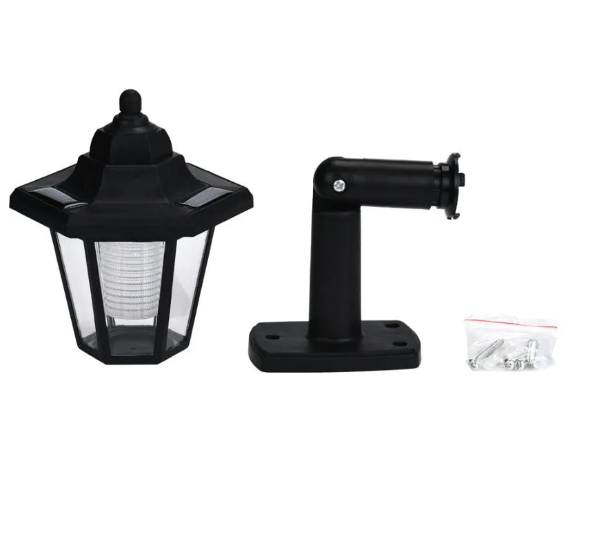 Black hexagonal solar wall lamp with LED illumination for outdoor garden lighting