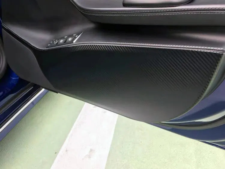 Carbon fibre anti-scratch protective film kit for Tesla Model S car doors.