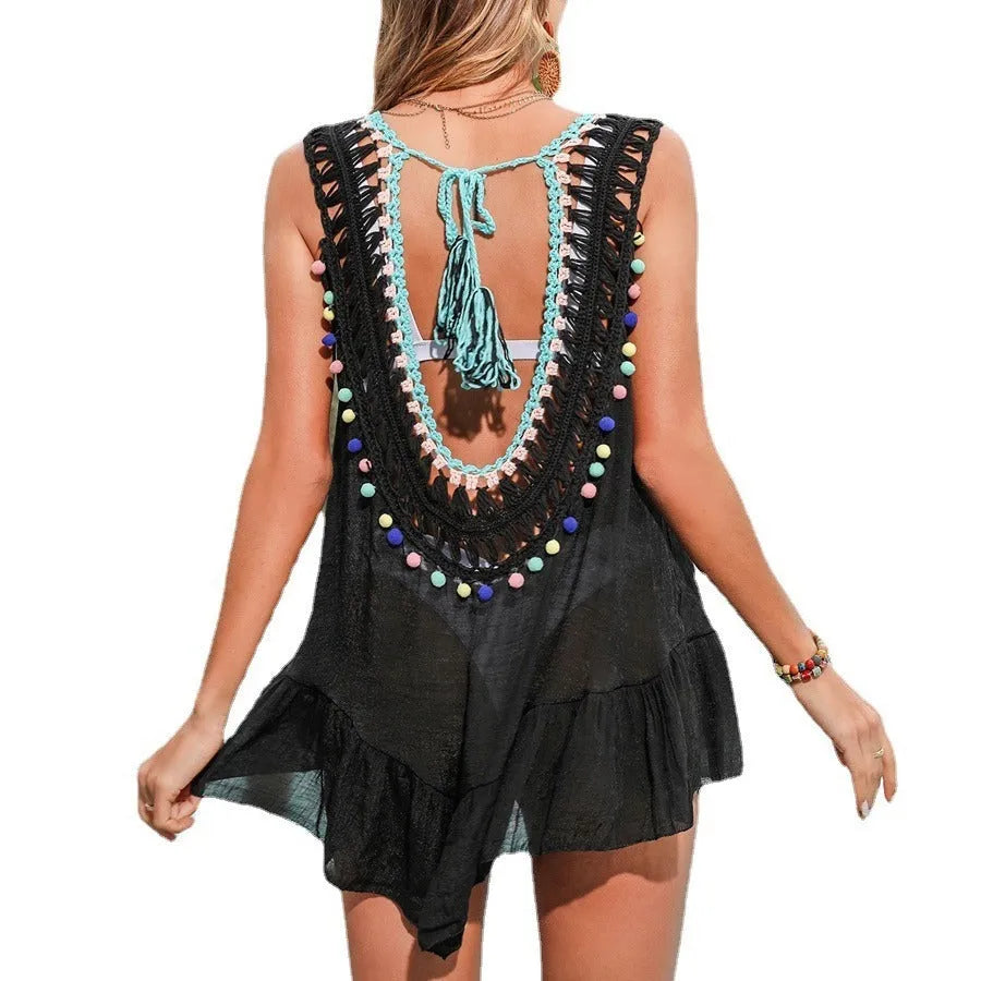 Black hand-crocheted women's beach cover-up with cut-out ruffled design and polyester lining