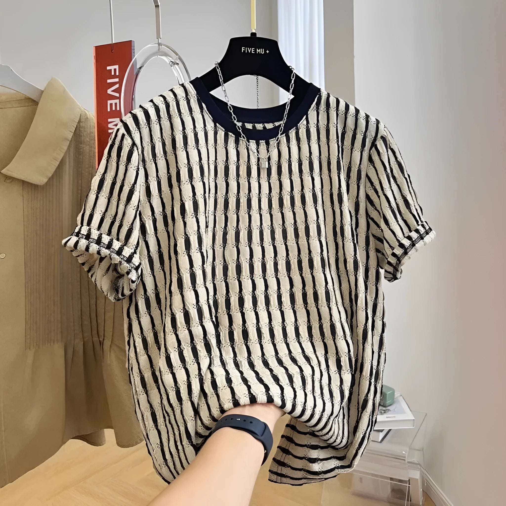 Black striped men's casual shirt with loose fit and short sleeves
