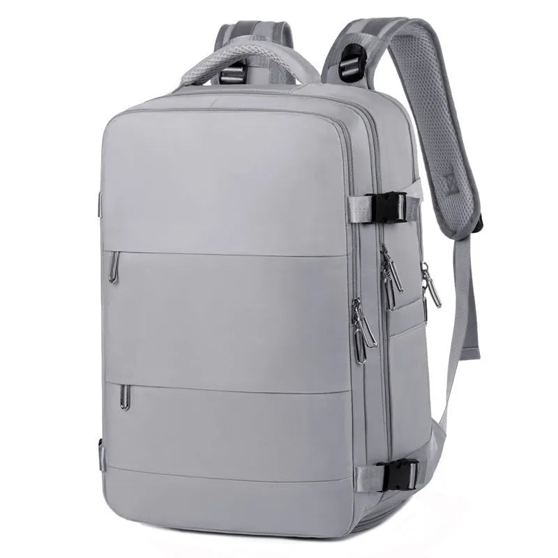 Large purple travel backpack for women with laptop compartment and organisational pockets.