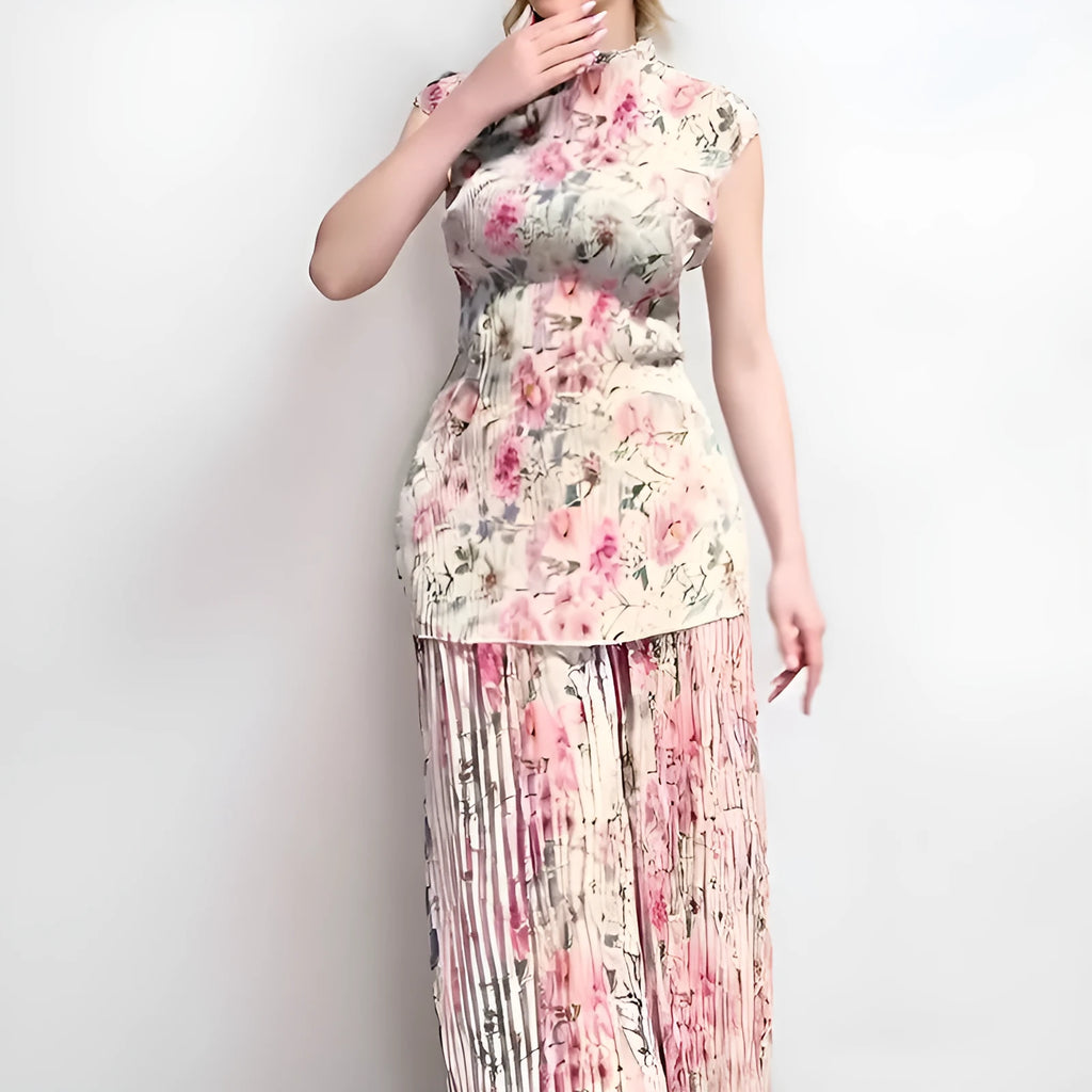 Long sleeve printed high-waist chiffon dress set with matching top and skirt on a model.