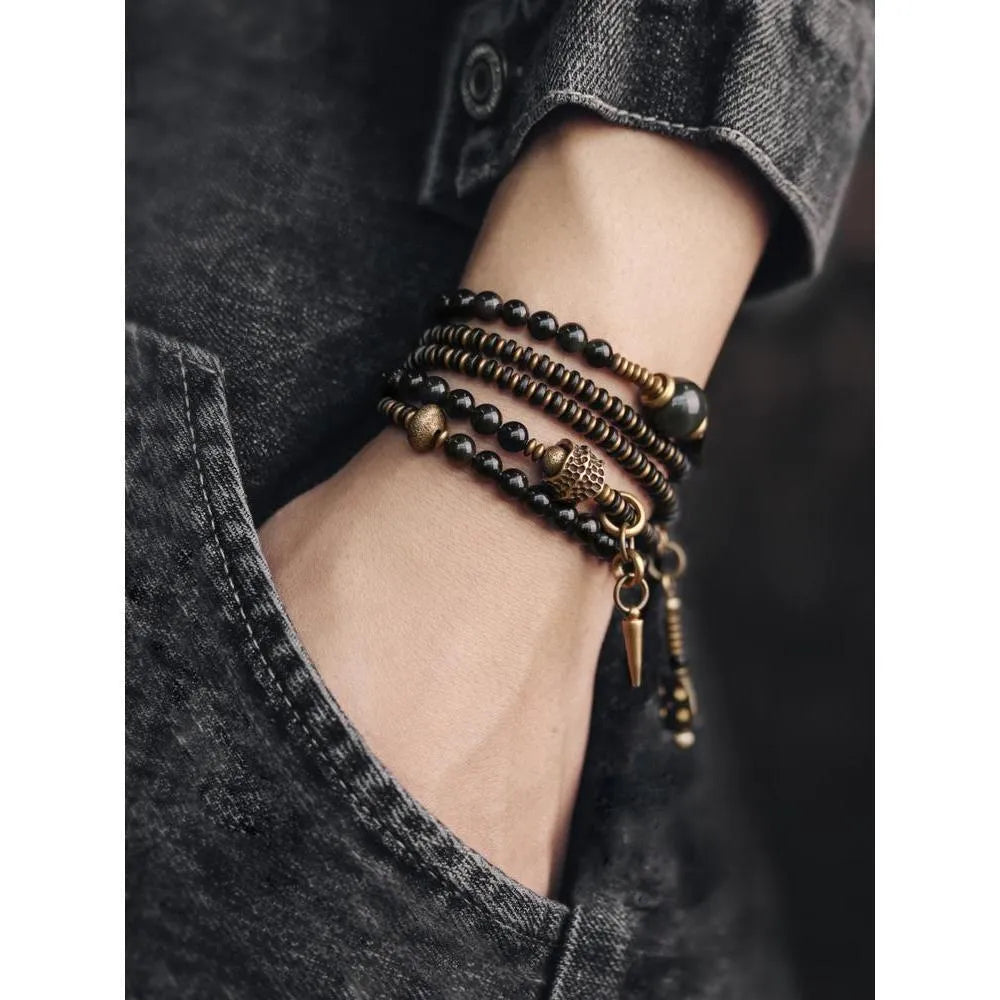 Geometric black stone beaded bracelet with multi-layered retro design