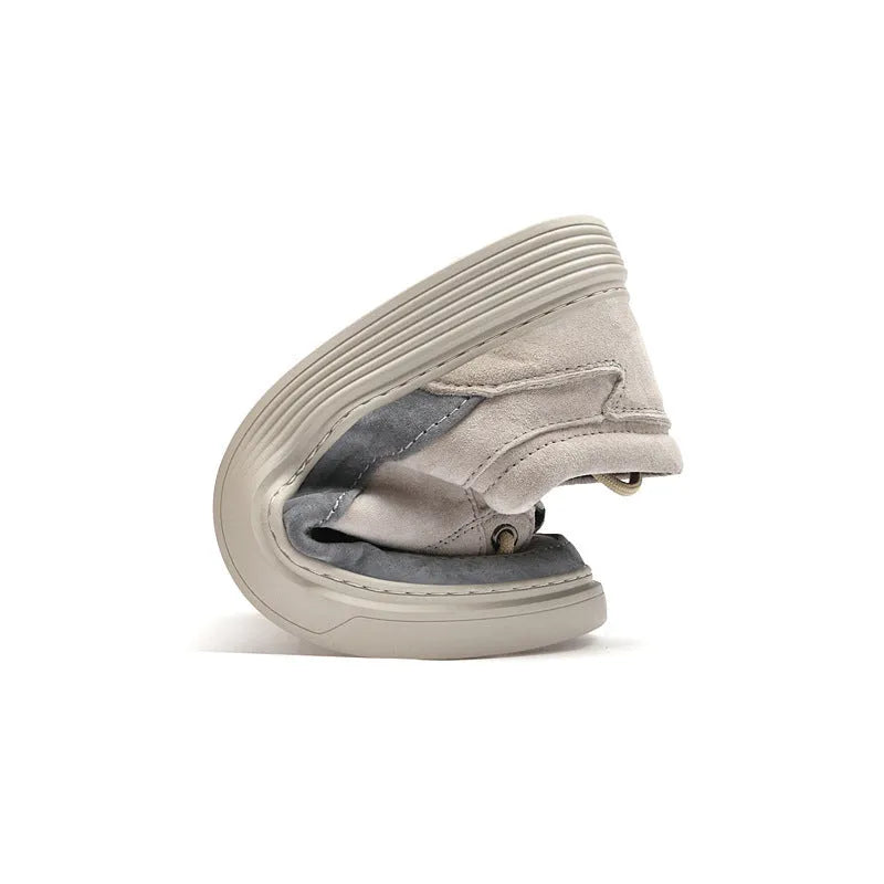 Men's grey casual leather skate shoes with round toe and low-top design on a rubber sole.