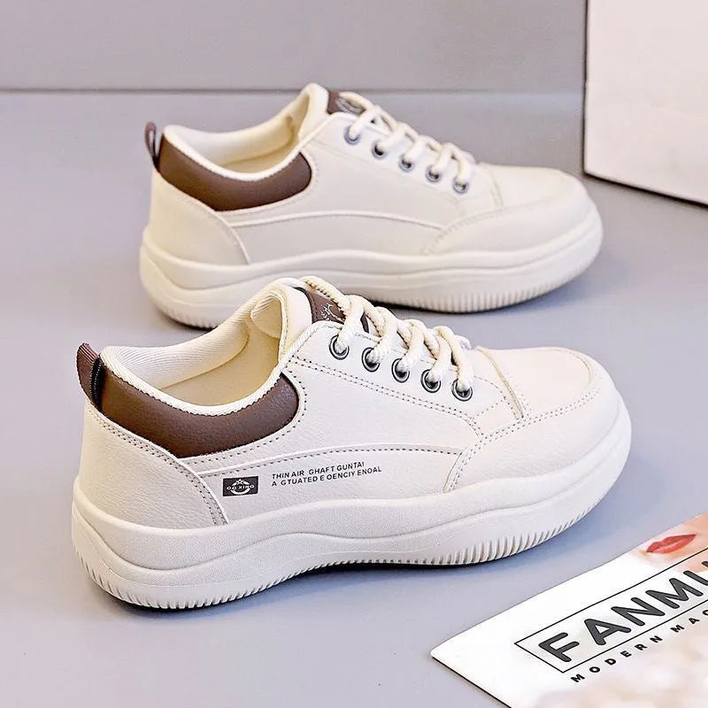 Women's white Korean-style leather pumps with cross-strap detailing and lace-up front