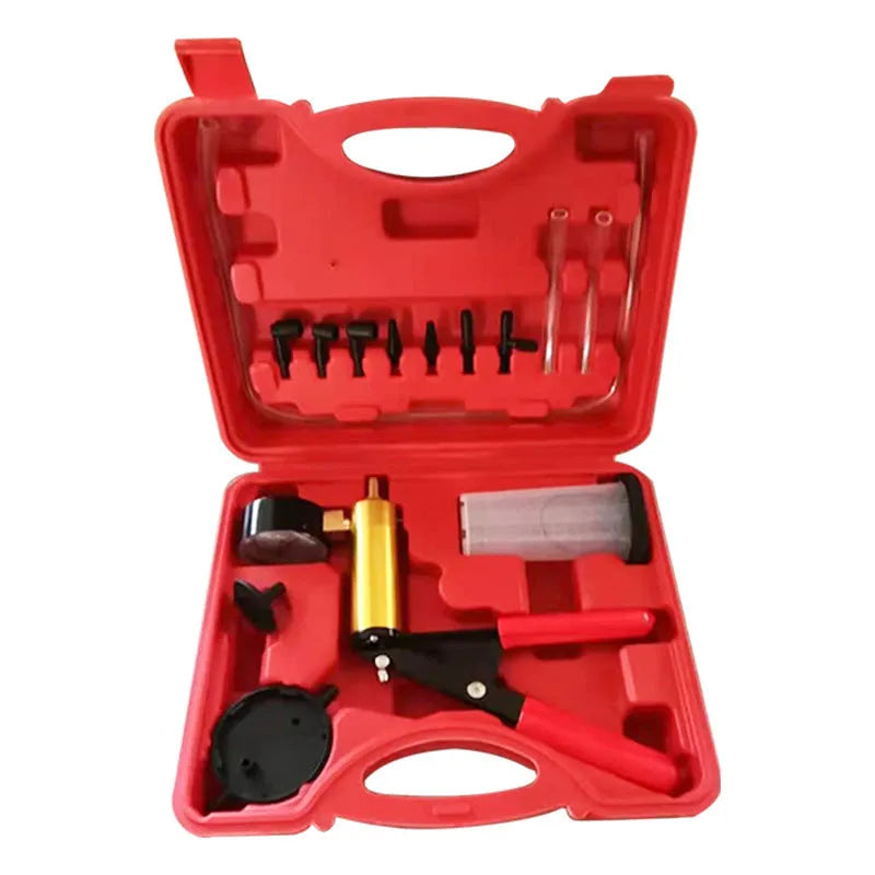 Manual aluminium alloy vacuum air blow gun suction tool for car repair on a workshop bench.