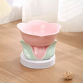 Blue ceramic elevated pet bowl with floral pattern and non-slip base for cats and small dogs
