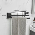 Black folding towel bar with adhesive installation for bathroom use