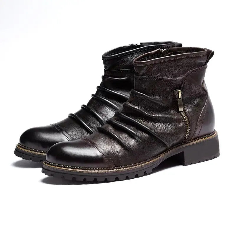 Brown mid-calf Martin boots with side zipper, embossed pattern, and a rubber sole with a mid-heel.