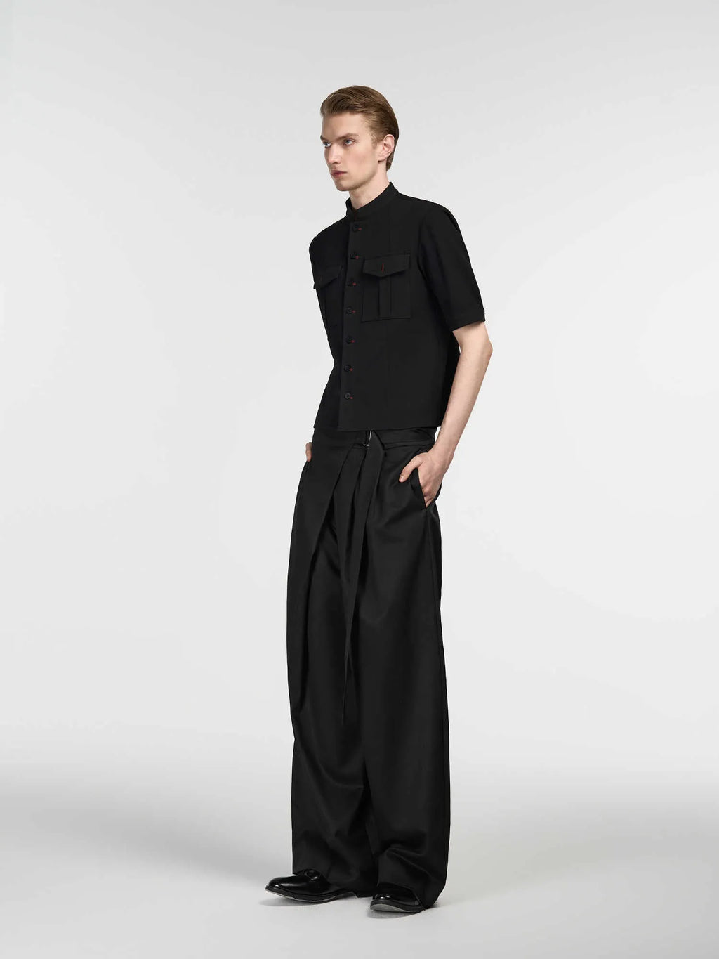 Black loose cut straight-leg trousers with adjustable waist in Tencel-cotton fabric