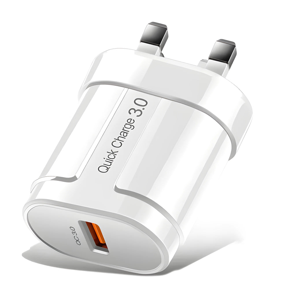 White international smart phone charger with UK plug on a wooden surface