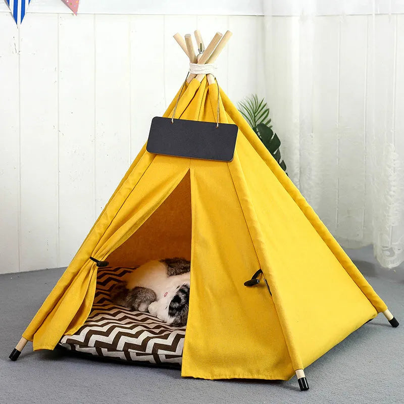 White portable pet teepee tent with striped pattern and cushion inside for small dogs or cats.
