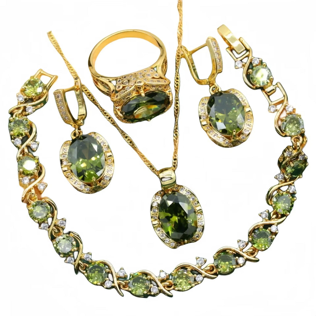 Olive green zircon rhinestone jewellery set on snake bone chain with crown pendant, plus matching earrings and ring.