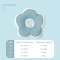 Soft cotton cat recovery collar in light blue with adjustable strap, shown on a table.