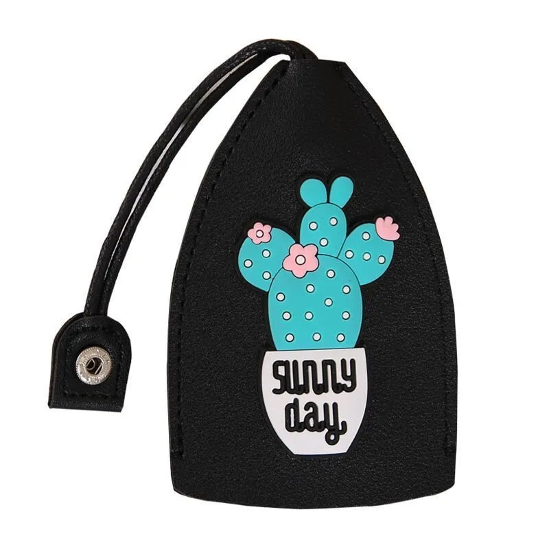 Cartoon patterned pull-out car key case made from PU leather, showing the open design.