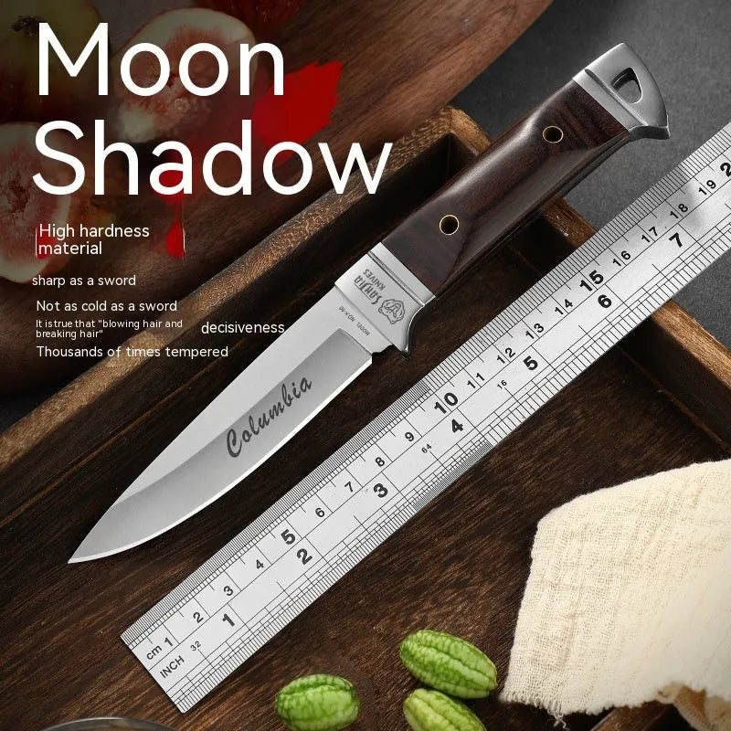 Camping multifunctional fruit knife with stainless steel blade and brown leather sheath.