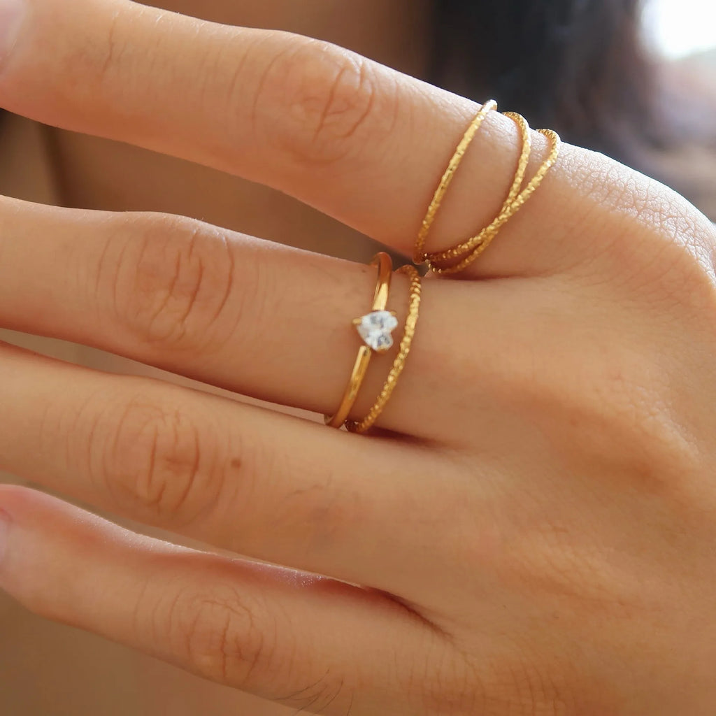 Golden electroplated stainless steel ring with love heart and oval designs for women