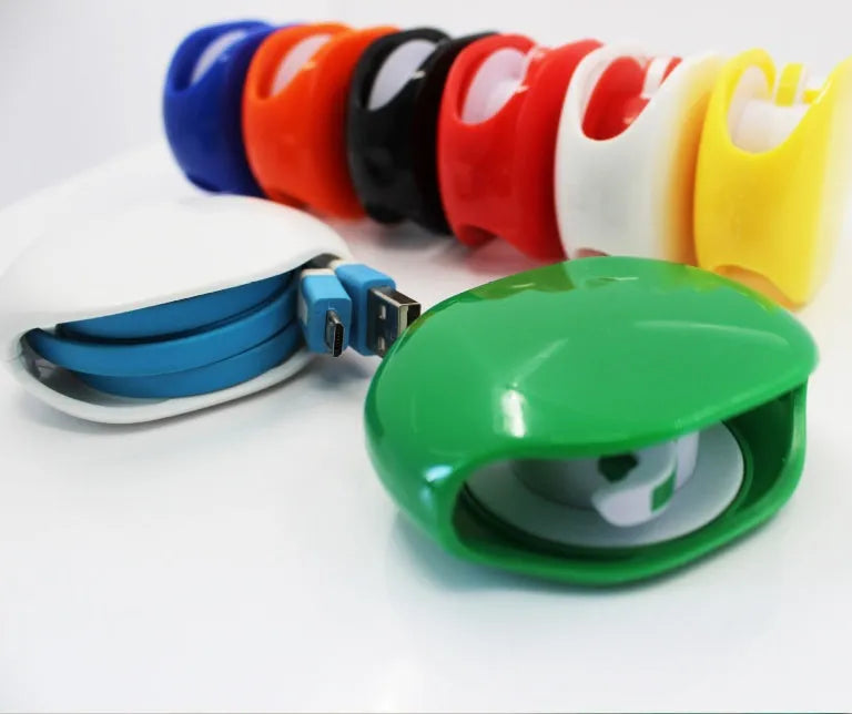 Automatic earphone cable winder with telescopic push mechanism showing compact design