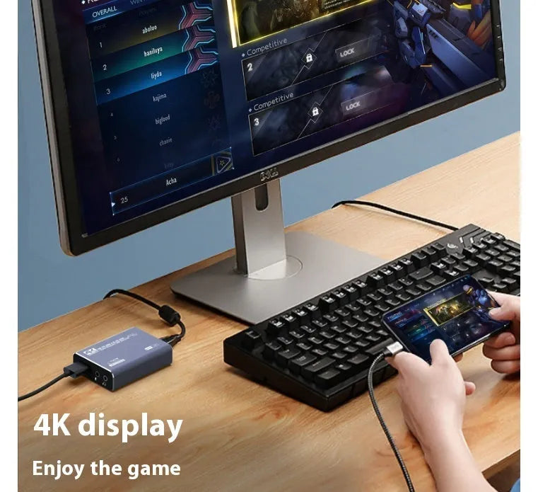 Black 4K gaming set-top box with audio recording function and MS2131 chip.
