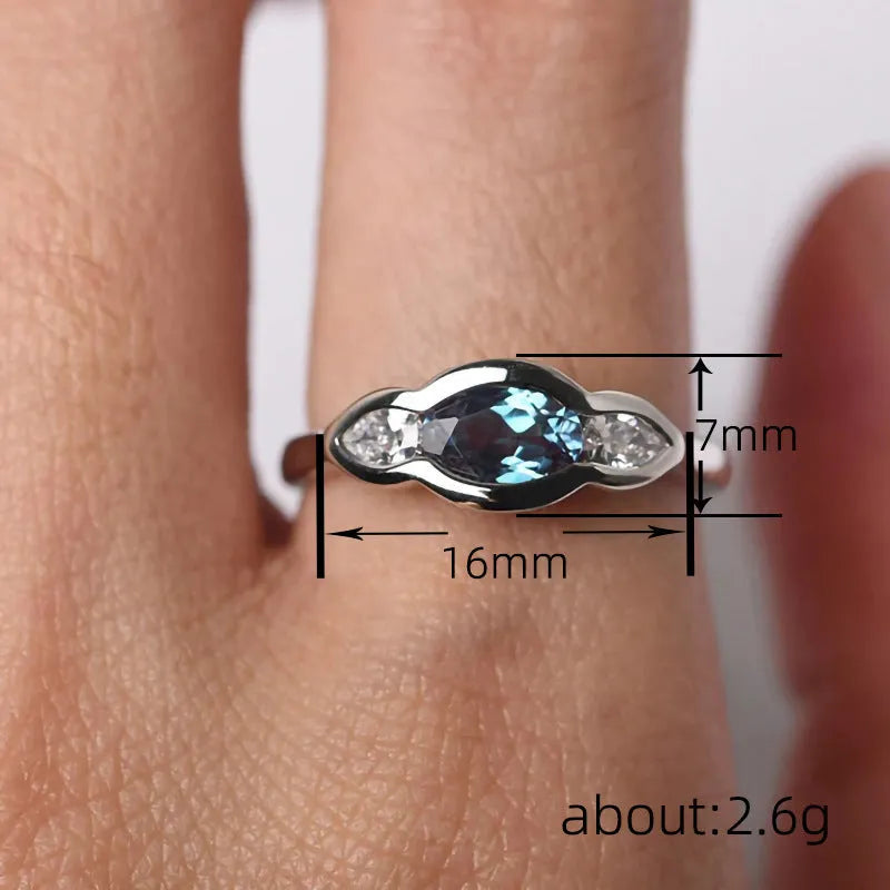 Women's geometric ellipse ring with inlaid zircon stone in white gold colour