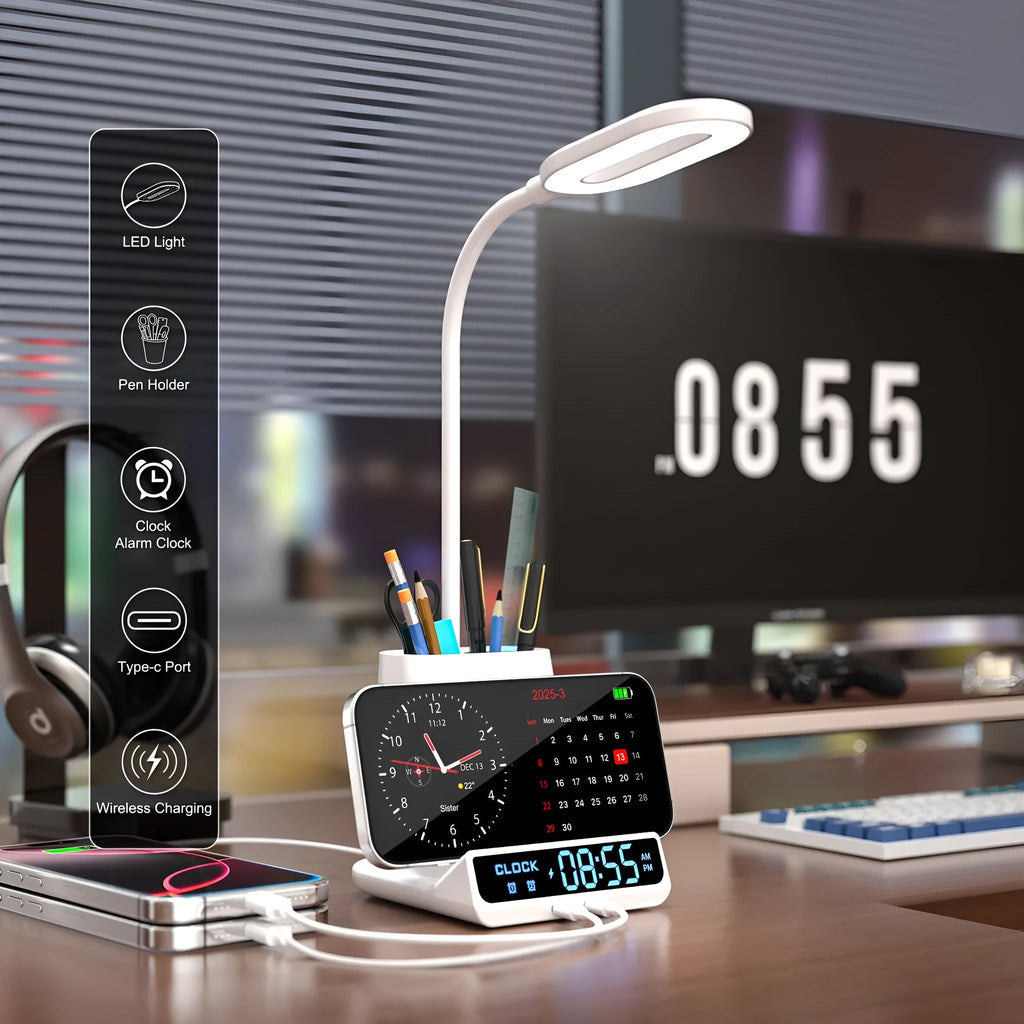 Modern black and white desk lamp with wireless charging pad, pen holder, and storage compartment.